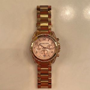 Michael Kors rose gold watch with light pink face